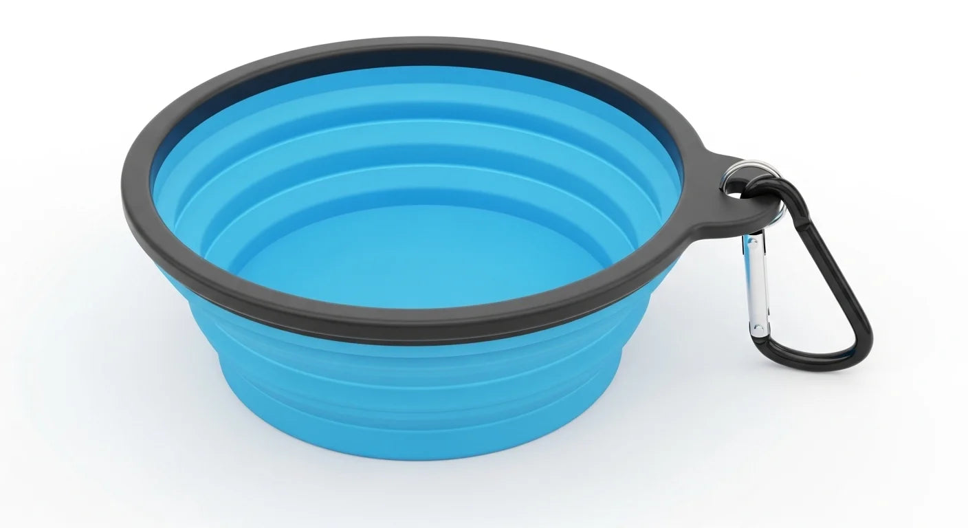 A blue collapsible silicone dog bowl with a black rim and carabiner clip attached.